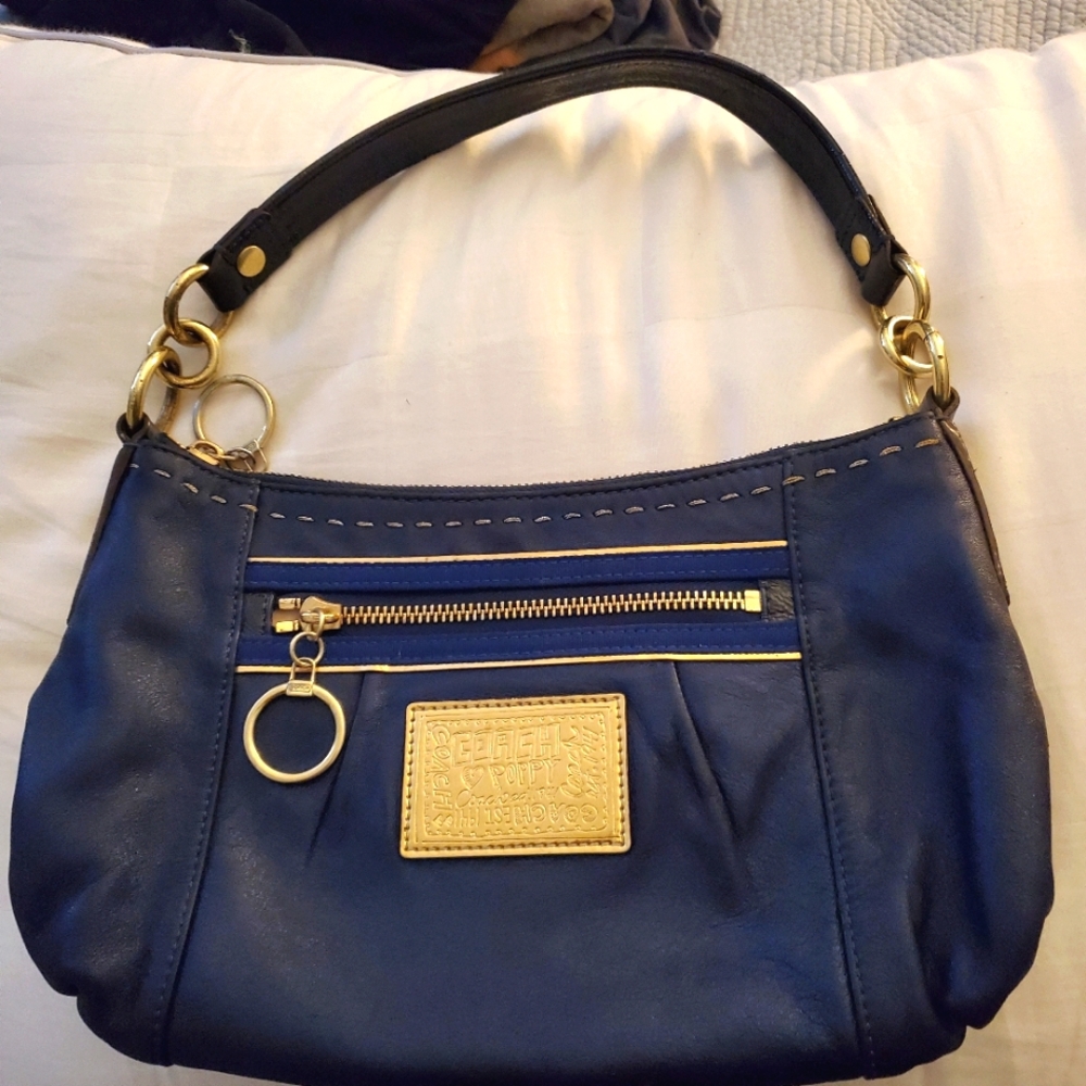 Coach Poppy handbag in liquid blue.